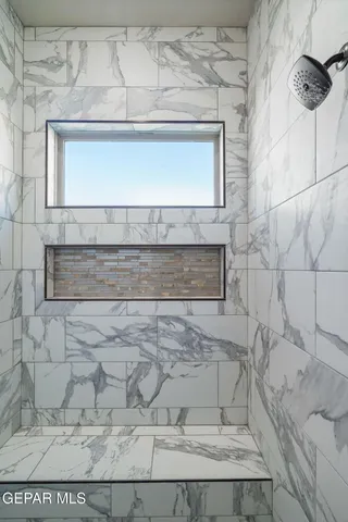 a living room with a rug