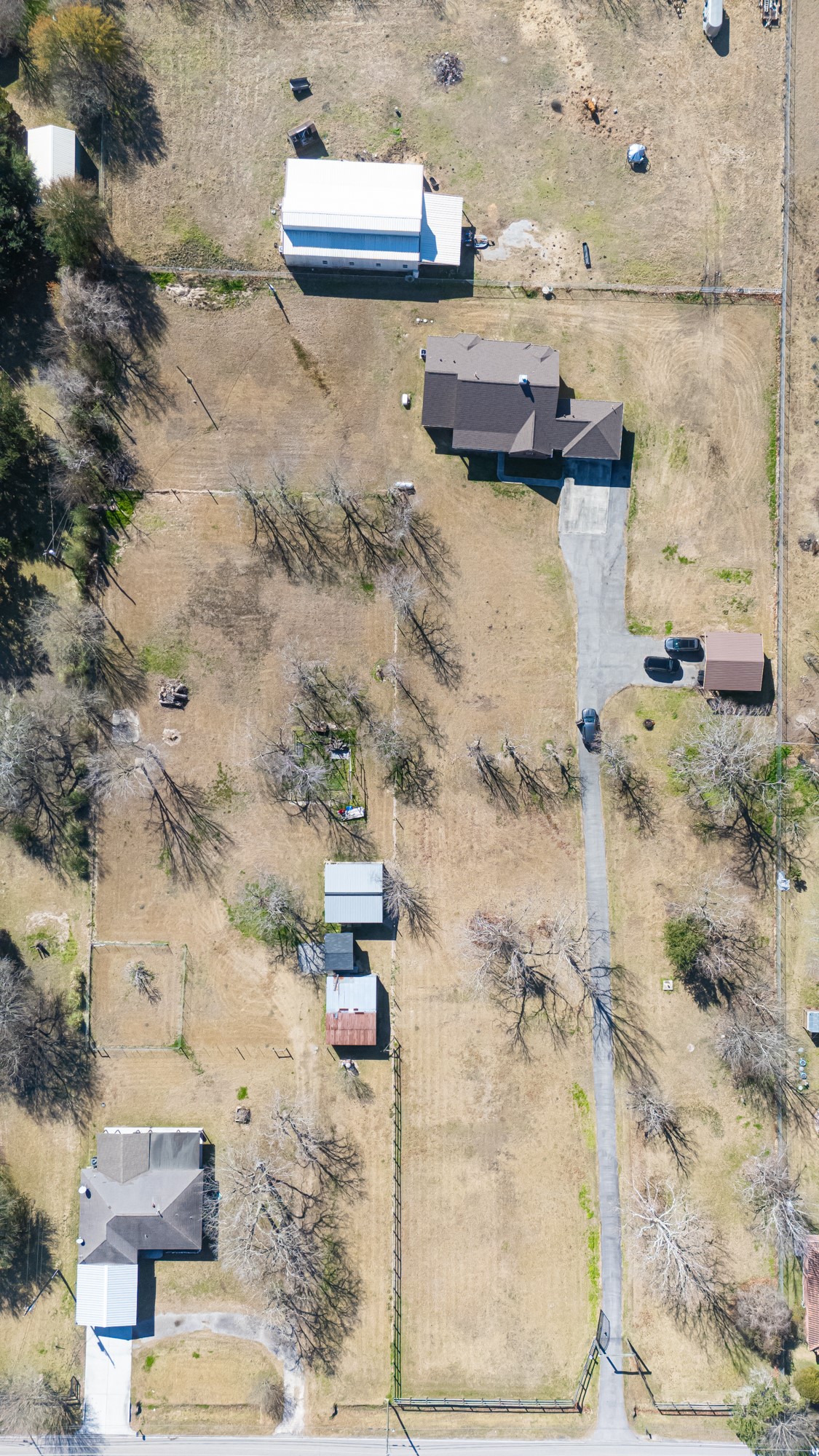 3418 Barbers Hill Road Highlands, TX 77562 - Photo 46 of 50 a aerial view of a house with a yard
