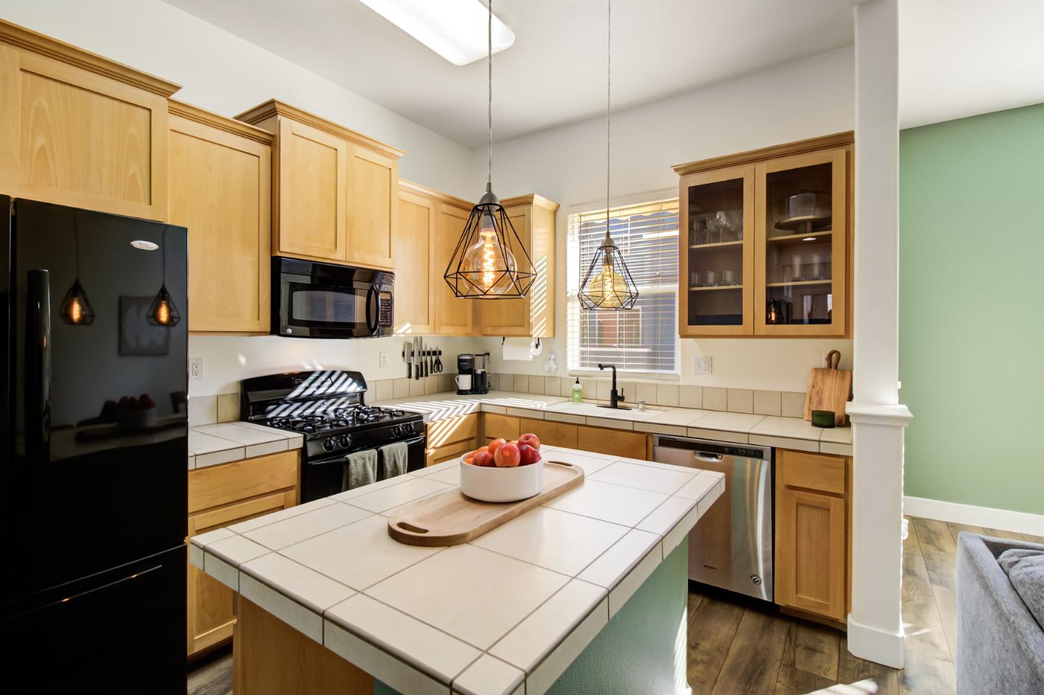 10890 Disk Drive Rancho Cordova, CA 95670 - Photo 12 of 43 a kitchen with stainless steel appliances granite countertop a sink stove and refrigerator