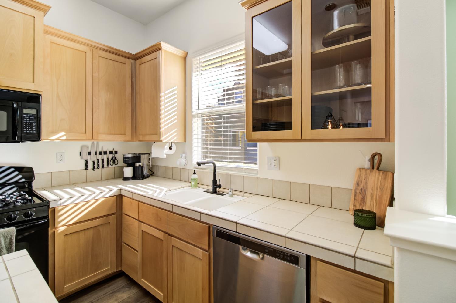 10890 Disk Drive Rancho Cordova, CA 95670 - Photo 13 of 43 a kitchen with a sink and a stove