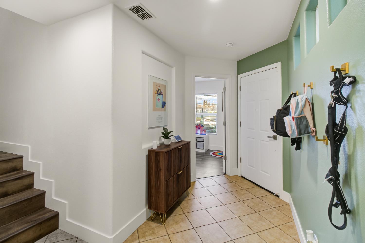 10890 Disk Drive Rancho Cordova, CA 95670 - Photo 31 of 43 a view of a hallway with a closet and a livingroom view