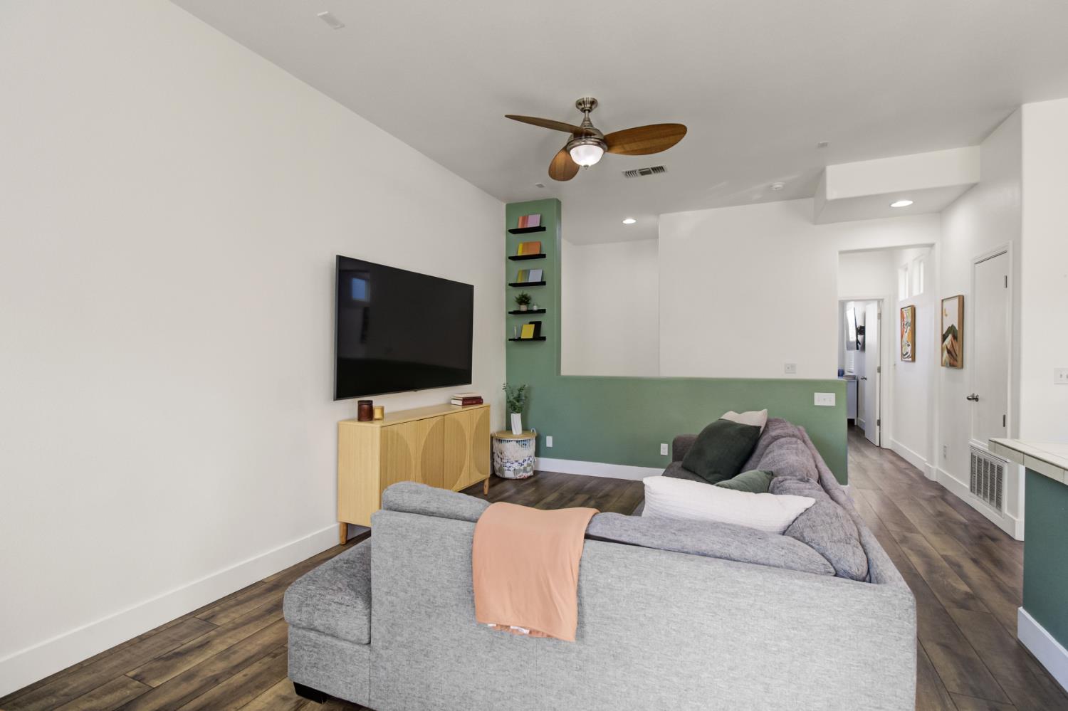 10890 Disk Drive Rancho Cordova, CA 95670 - Photo 7 of 43 a living room with furniture and a flat screen tv
