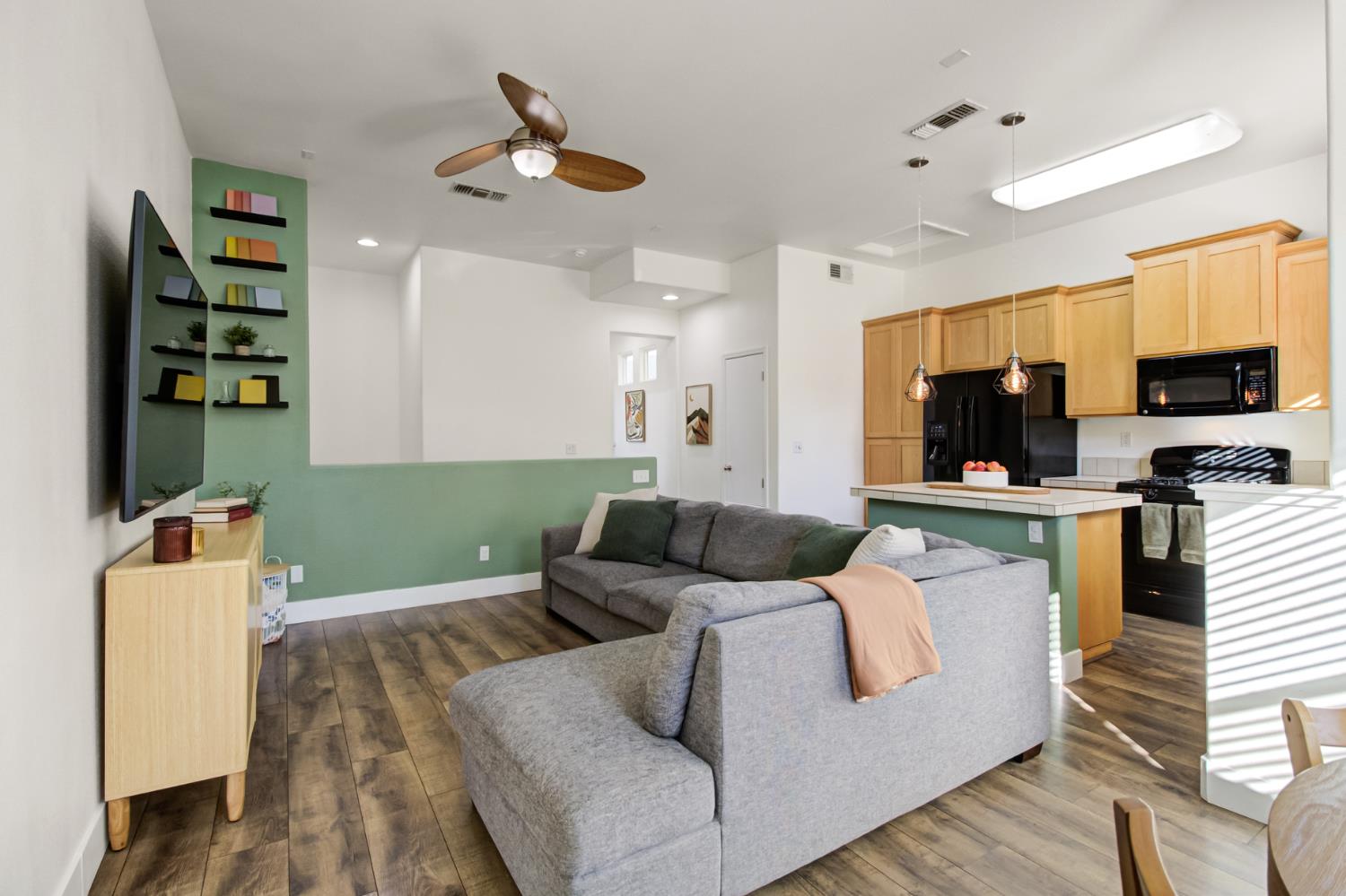 10890 Disk Drive Rancho Cordova, CA 95670 - Photo 8 of 43 a living room with furniture and a flat screen tv