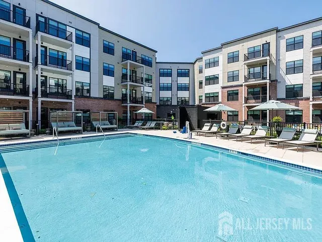 a front view of building with outdoor seating