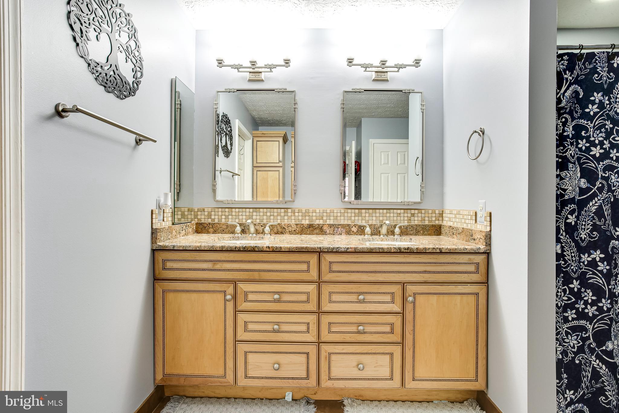 10432 Stansfield Road Laurel, MD 20723 - Photo 17 of 32 Primary bathroom - double sink & linen closet