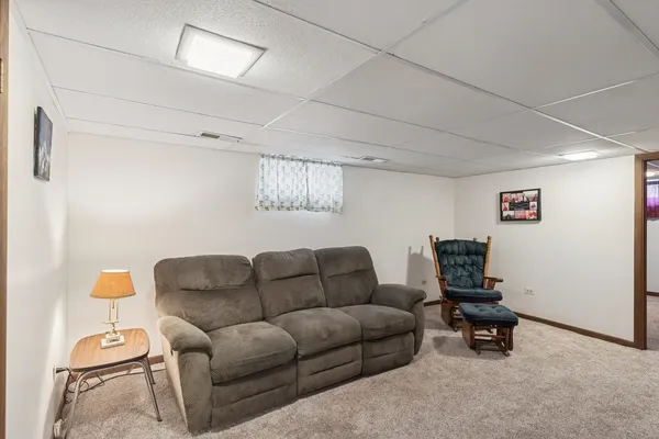 a living room with furniture and a couch