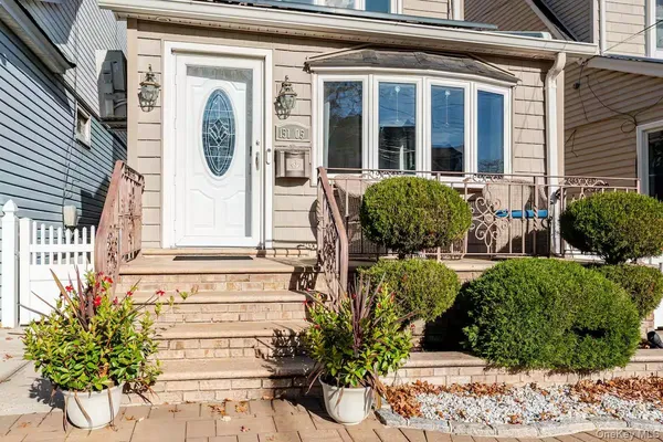 a view of outdoor space with seating area and trees around