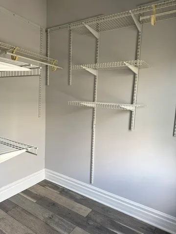 a view of an empty walk in closet