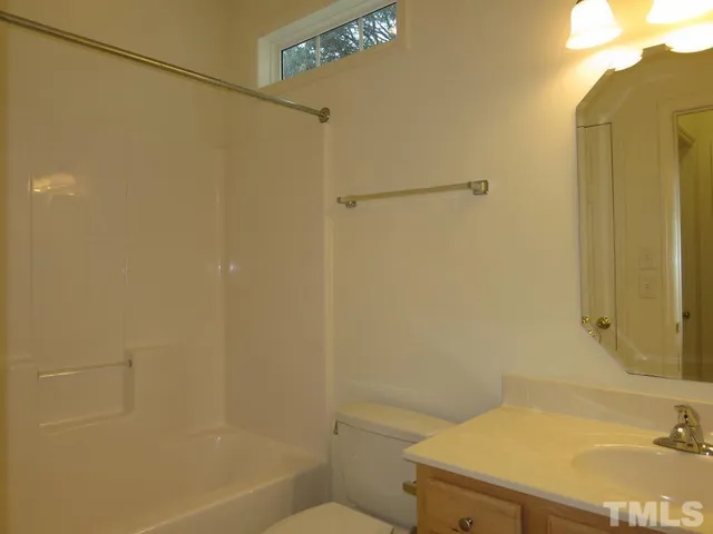 a bathroom with a sink and a shower