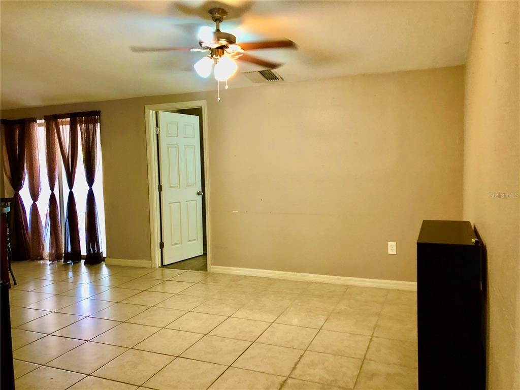 7537 Jasmine Boulevard Port Richey, FL 34668 - Photo 12 of 15 a view of a hallway with interior of the house