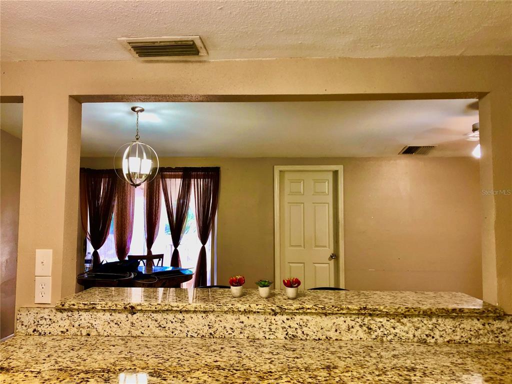 7537 Jasmine Boulevard Port Richey, FL 34668 - Photo 4 of 15 a view of wooden door