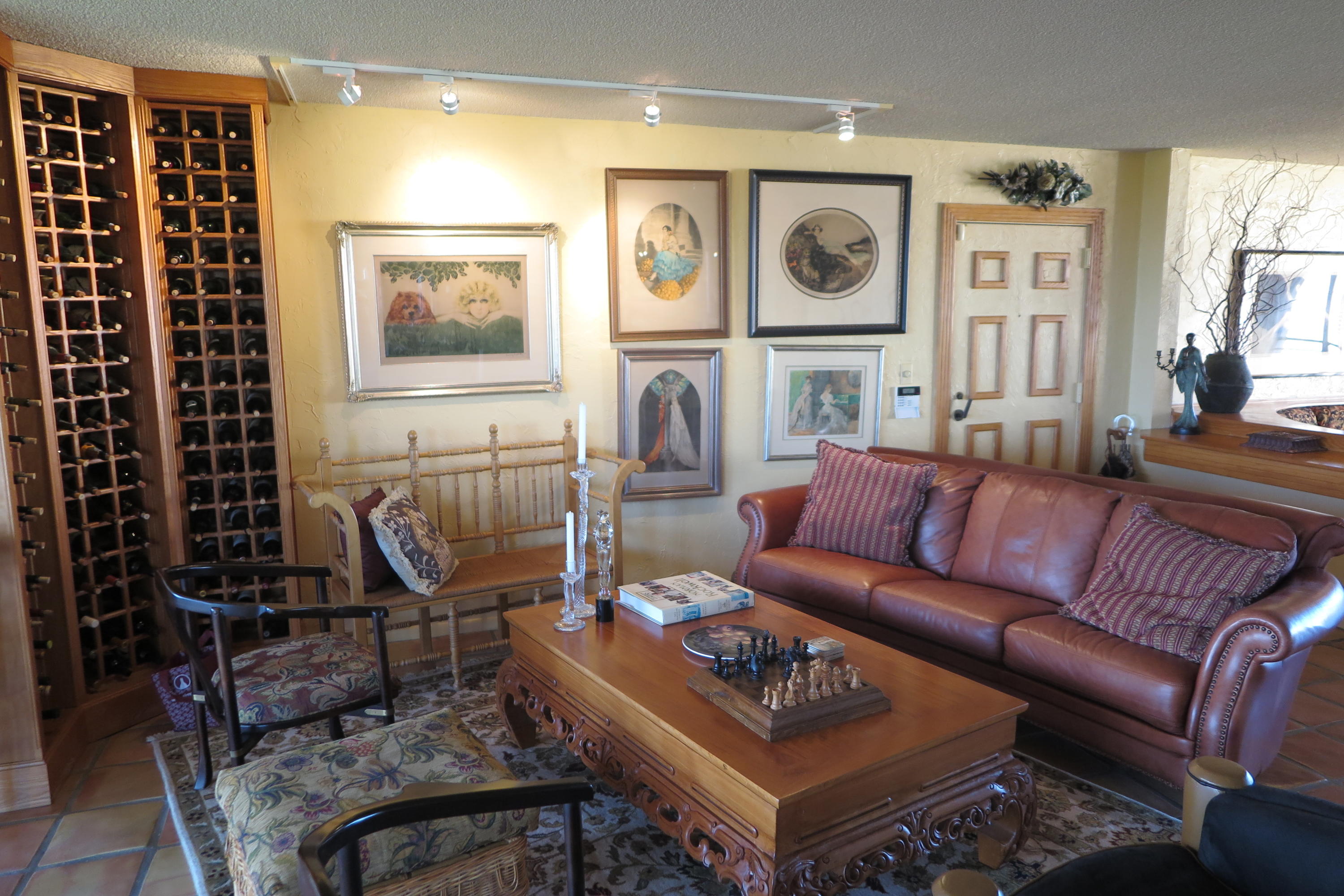 7186 Promenade Drive, Unit 801 Boca Raton, FL 33433 - Photo 12 of 21 a living room with furniture a rug and a wall painting