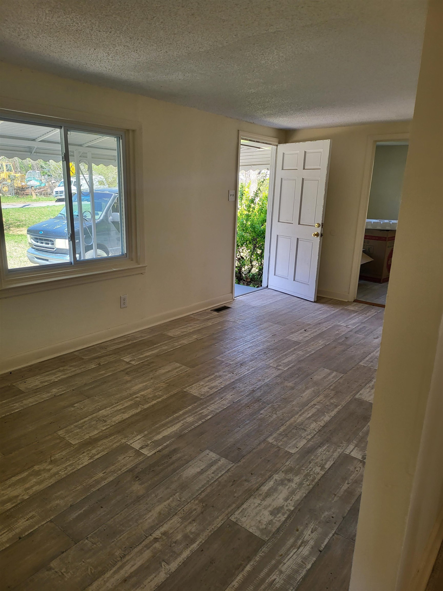 511 Royal Street Raleigh, NC 27607 - Photo 5 of 10 a view of an empty room with a window