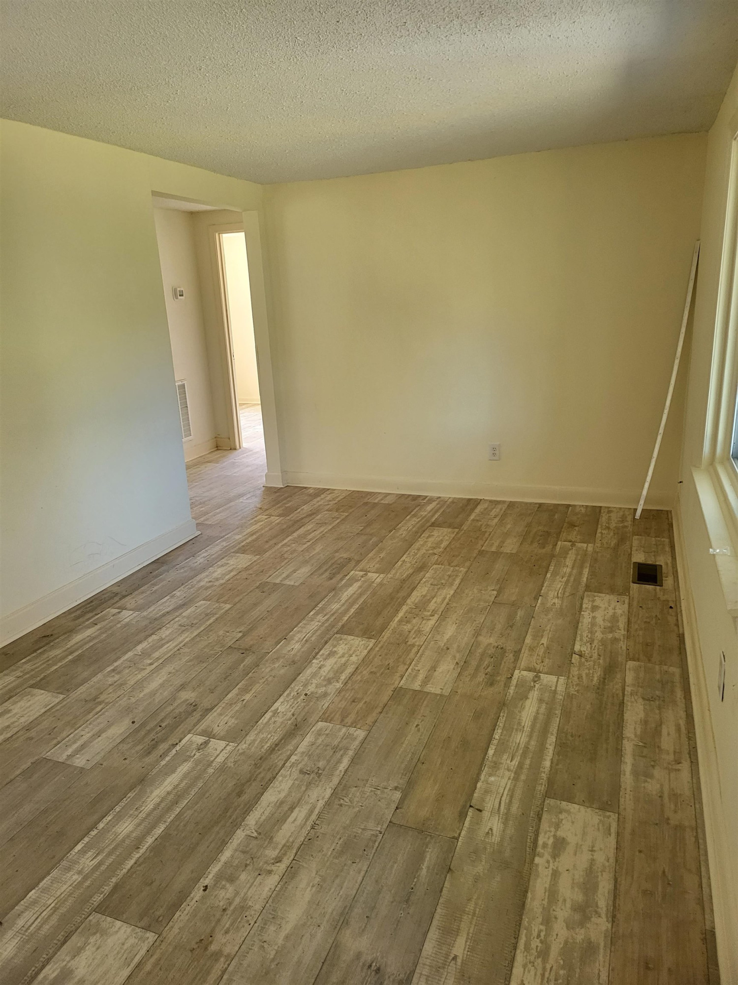 511 Royal Street Raleigh, NC 27607 - Photo 7 of 10 a view of hallway with wooden floor