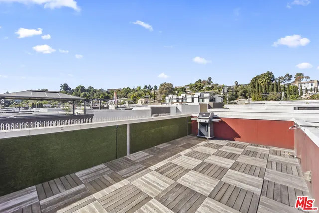 a view of a balcony with city view