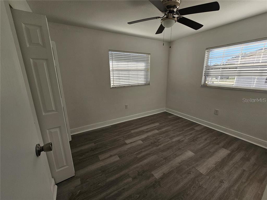 2349 Lisa Street Lake Wales, FL 33898 - Photo 15 of 16 a view of a room with wooden floor and windows
