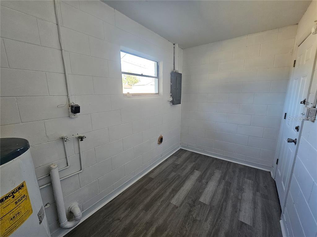 2349 Lisa Street Lake Wales, FL 33898 - Photo 9 of 16 a small space with wooden floor and a window