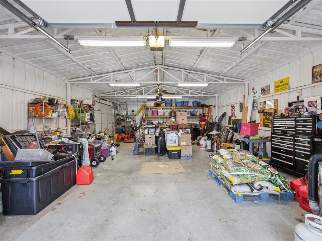 321 Niki Road Paradise, TX 76073 - Photo 31 of 40 a view of a storage room with lots of stuff