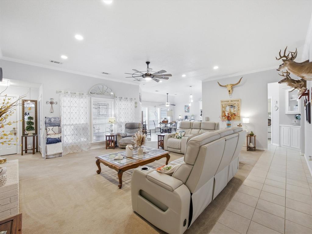 321 Niki Road Paradise, TX 76073 - Photo 9 of 40 a living room with furniture and a large window