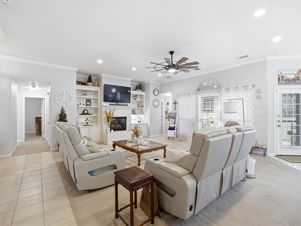 321 Niki Road Paradise, TX 76073 - Photo 10 of 40 a living room with furniture and a chandelier
