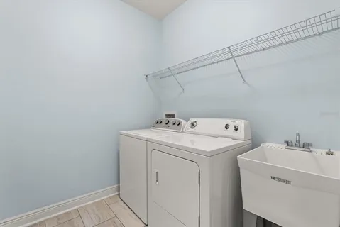 a utility room with dryer and washer