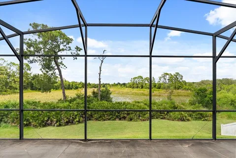 an aerial view of a house with a garden