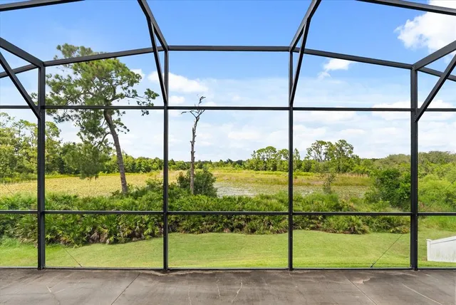 an aerial view of a house with a garden