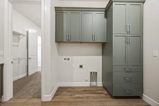a view of a utility room with closet