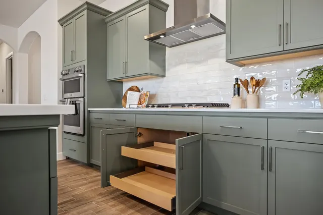 a room with cabinets and a wooden floor