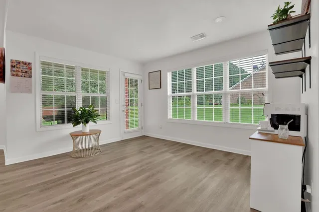 a view of a living room and a large windows