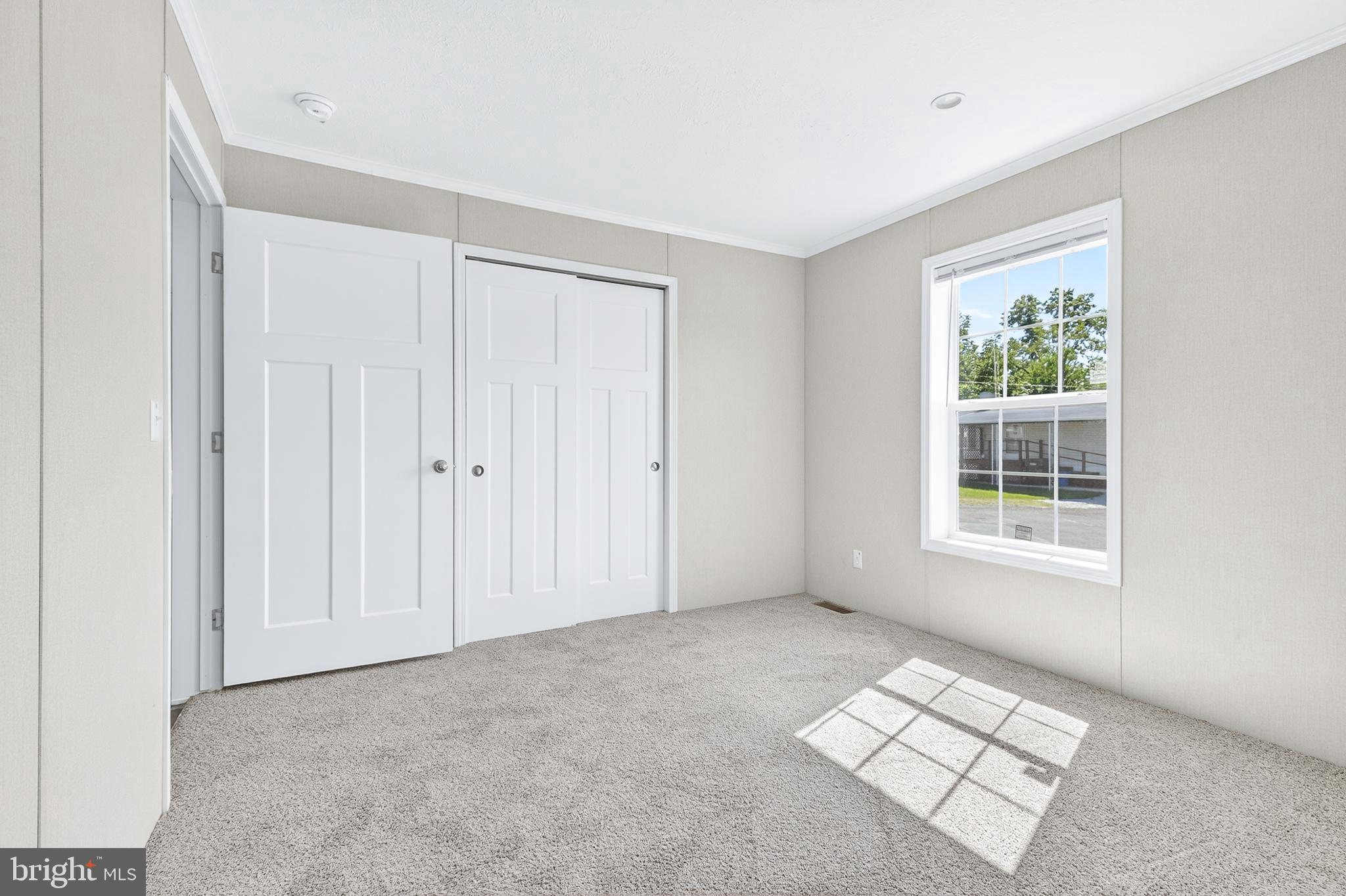313 Bordic Road Reading, PA 19606 - Photo 13 of 27 an empty room with windows