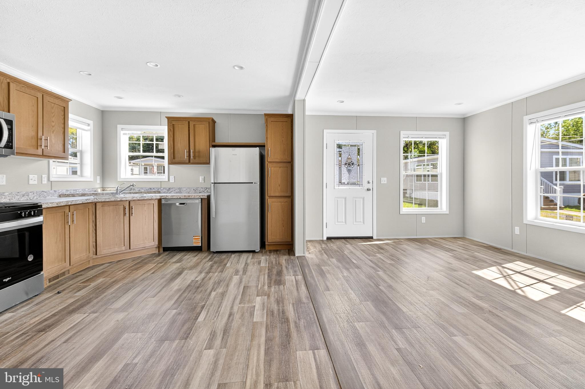 313 Bordic Road Reading, PA 19606 - Photo 20 of 27 a view of a kitchen with a sink a refrigerator and window