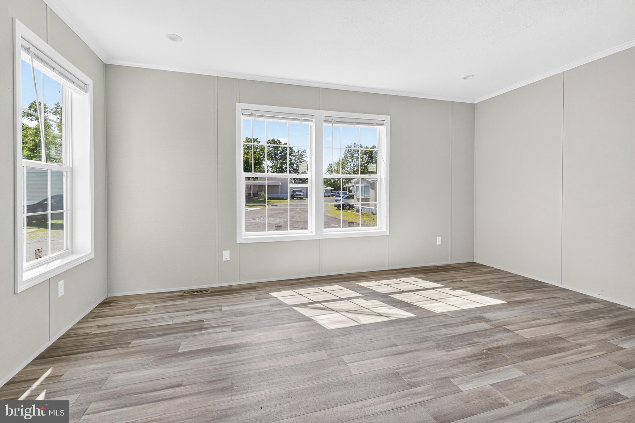 313 Bordic Road Reading, PA 19606 - Photo 24 of 27 a view of empty room with wooden floor and fan