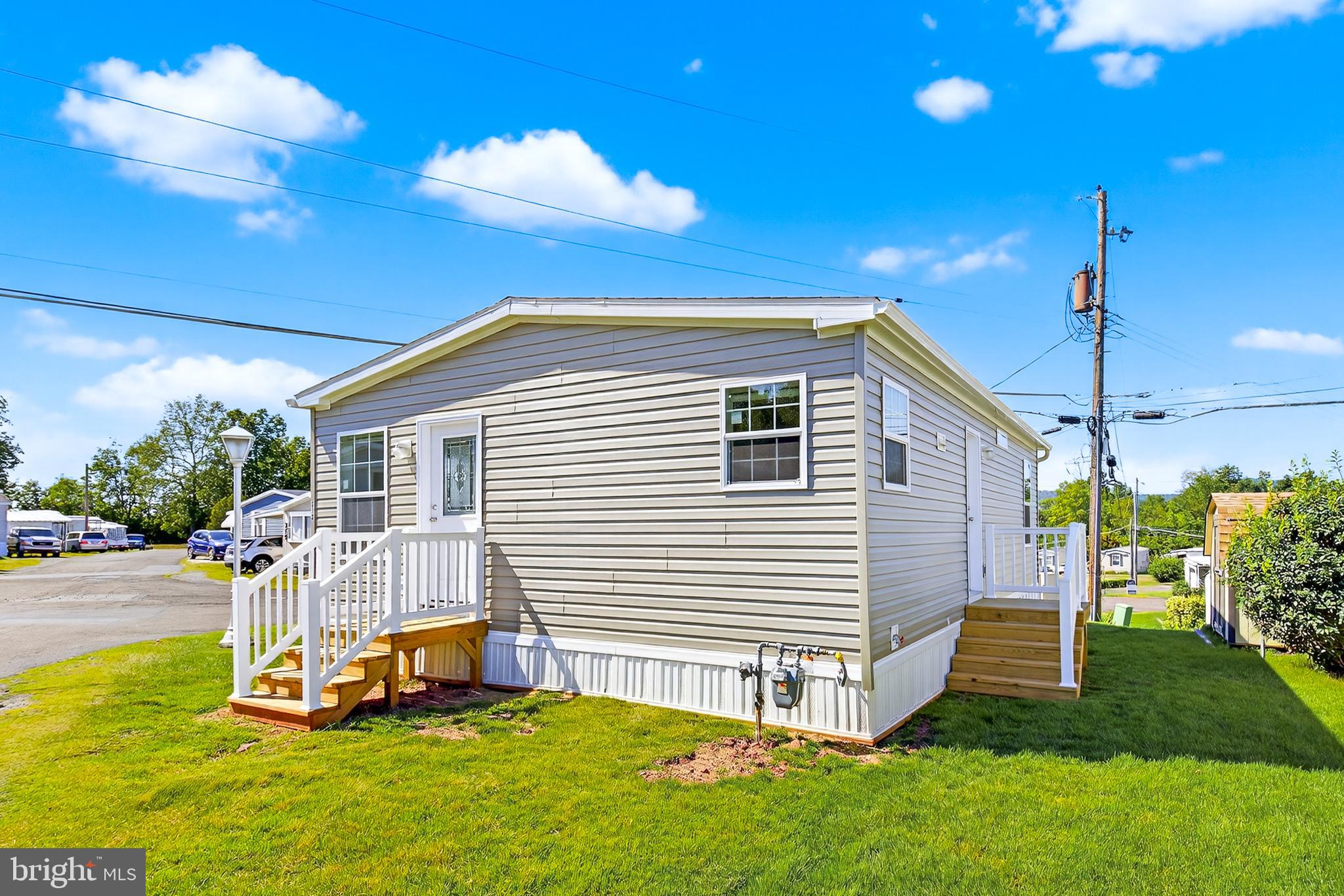 313 Bordic Road Reading, PA 19606 - Photo 25 of 27 a view of a house with a backyard
