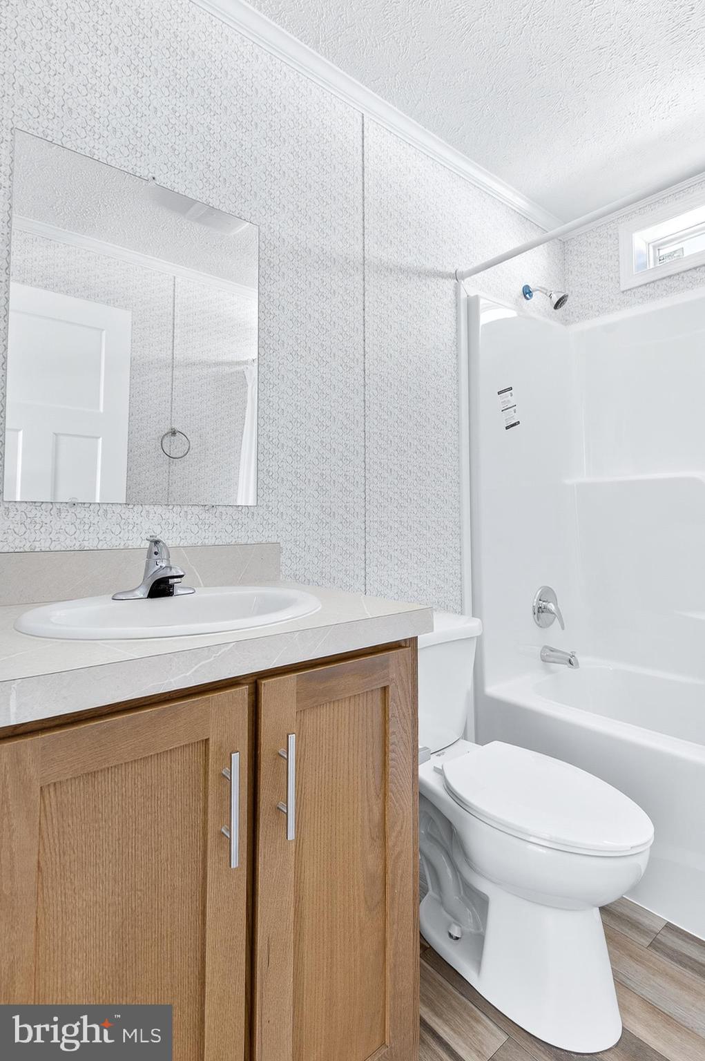 313 Bordic Road Reading, PA 19606 - Photo 8 of 27 a bathroom with a sink a toilet and shower