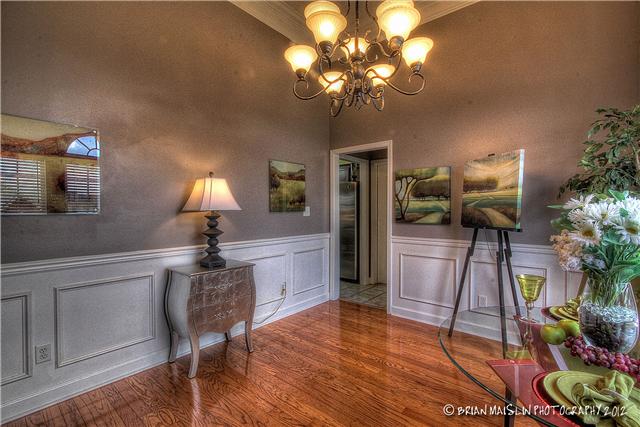 809 Riata Court Smyrna, TN 37167 - Photo 6 of 20 Dining with hardwood floors and wainscotting