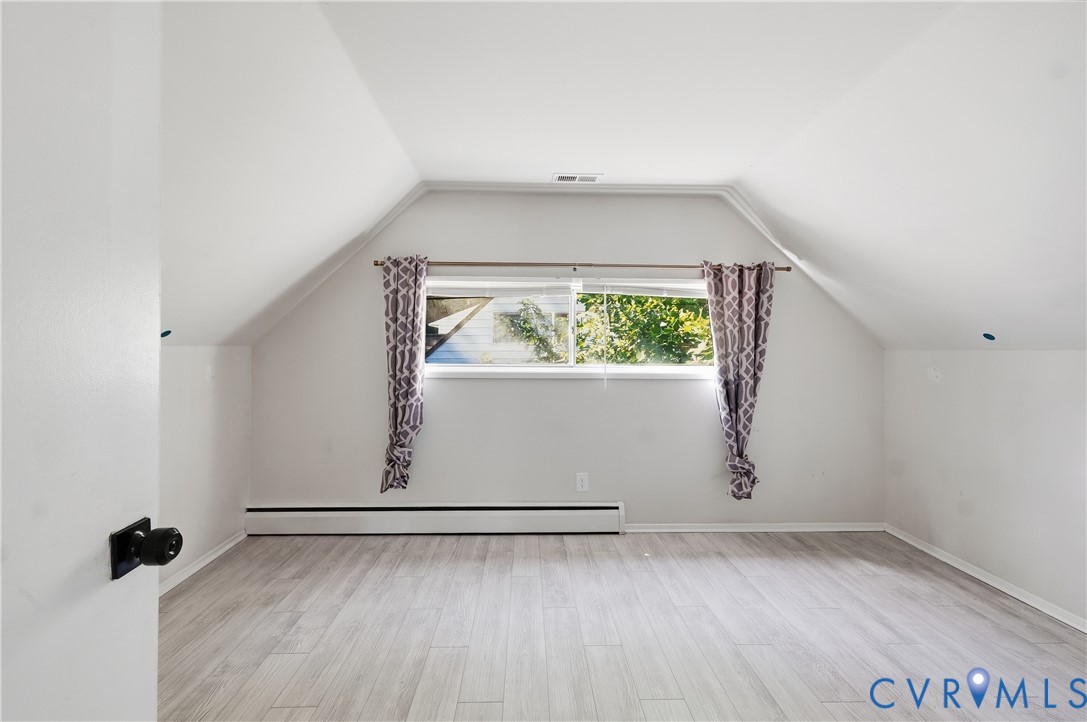 9207 Mapleway Road Richmond, VA 23229 - Photo 27 of 36 Sloped ceiling with recessed lighting, wood-finish