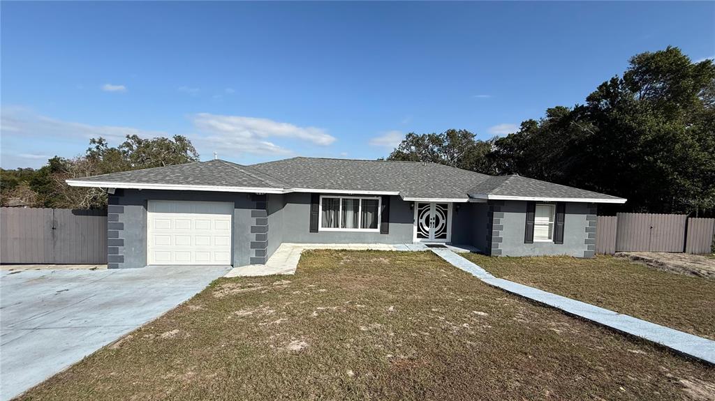 front view of a house with a yard