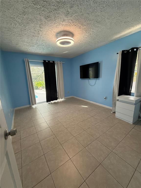 7223 Tarrytown Drive Spring Hill, FL 34606 - Photo 12 of 27 a view of a livingroom with an empty space