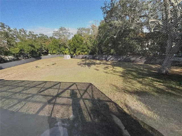 a view of a yard with mountain view