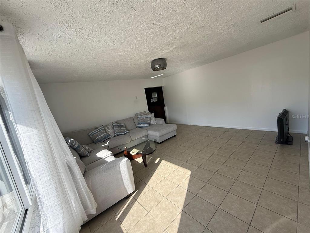 7223 Tarrytown Drive Spring Hill, FL 34606 - Photo 4 of 27 a view of storage and utility room