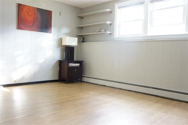 52 David Needham, MA 02494 - Photo 3 of 22 a view of an empty room with a window