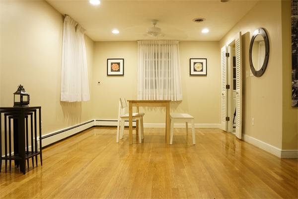 52 David Needham, MA 02494 - Photo 8 of 22 a view of a room with wooden floor and furniture