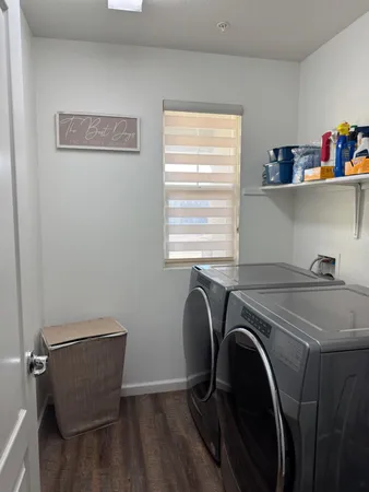 a bathroom with a toilet and a shower curtain