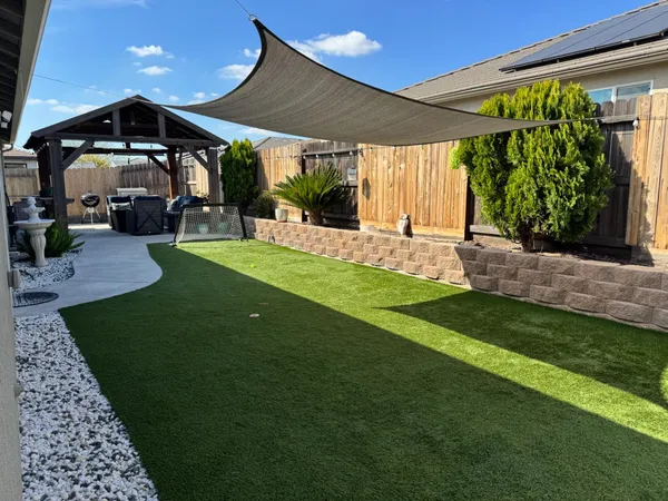 a view of a porch with a yard