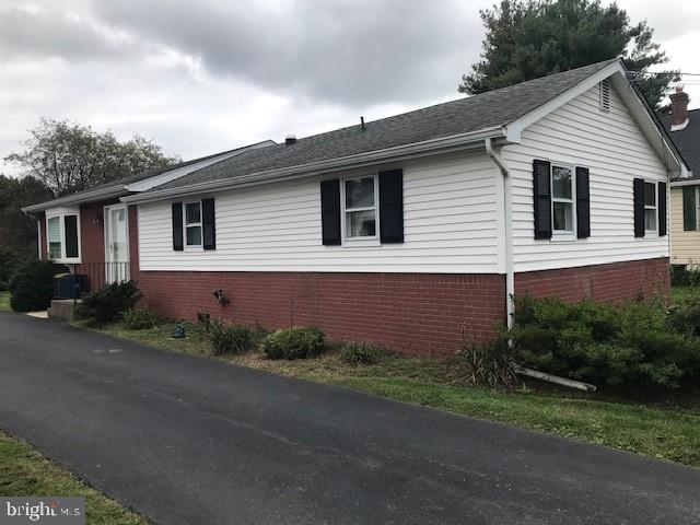 2602-2604 Ebright Road Wilmington, DE 19810 - Photo 2 of 16 a front view of a house with garden