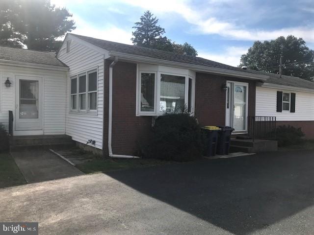 2602-2604 Ebright Road Wilmington, DE 19810 - Photo 3 of 16 a front view of a house with yard