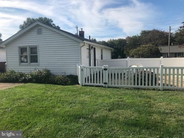 2602-2604 Ebright Road Wilmington, DE 19810 - Photo 7 of 16 a view of a house with backyard and trees