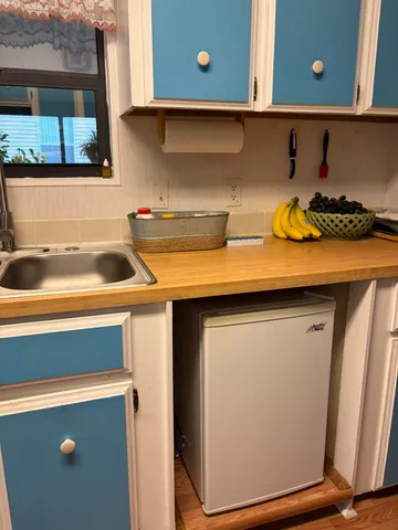 a kitchen with a sink and a cabinets