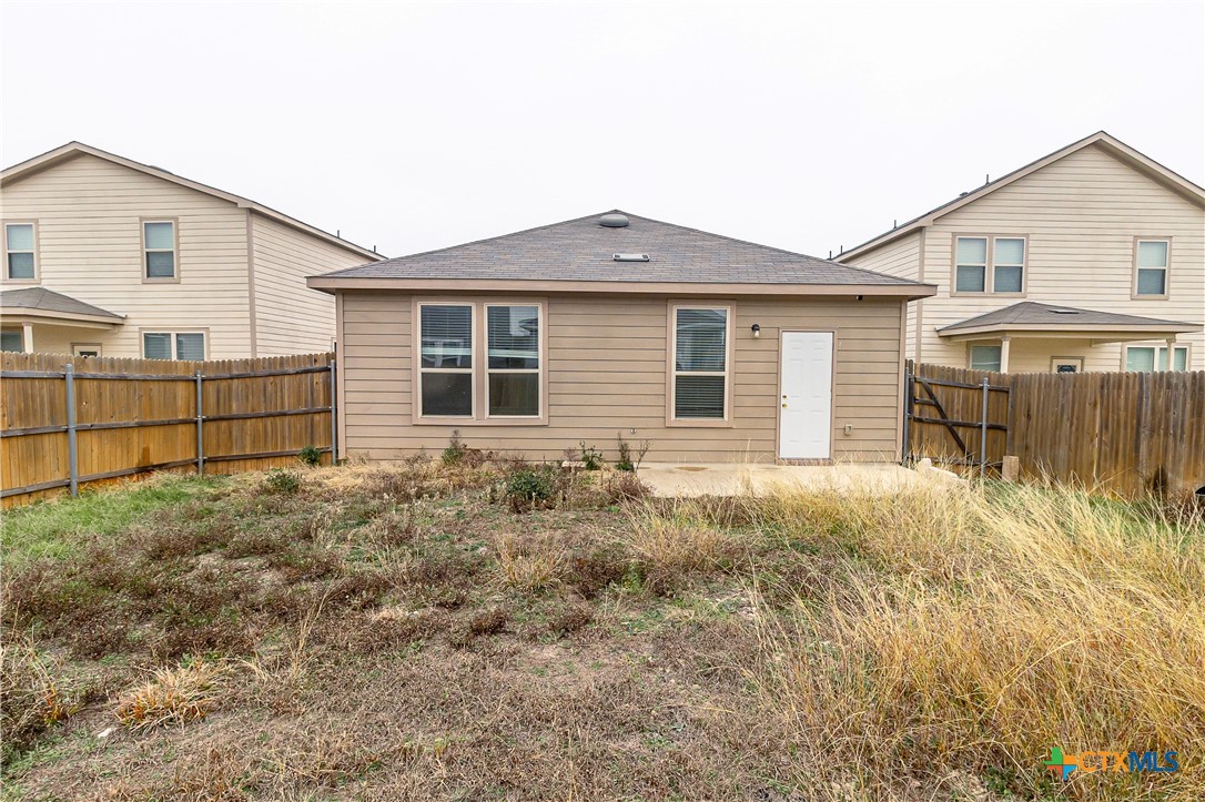145 Miracle Drive Jarrell, TX 76537 - Photo 22 of 23 a front view of a house with a yard